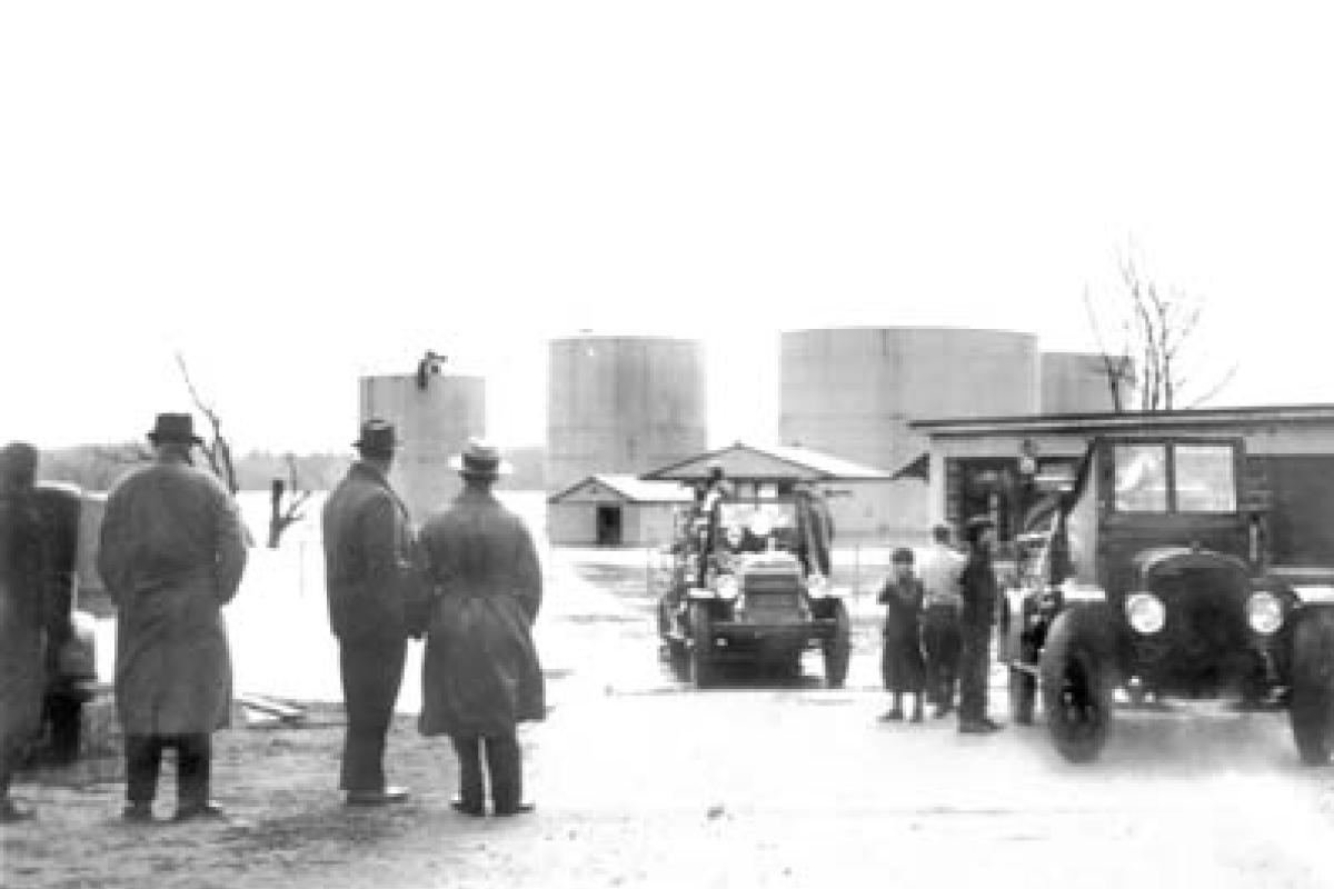 Socony Company storage tanks. March 20, 1936 photo of flooding on Novelty Lane, currently home of Essex Yacht Club.